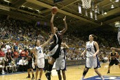 Marissa Coleman soars in to make the layup