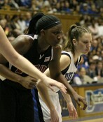 Sade Wiley-Gatewood and Emily Waner wait in the blocks for a Laura Harper free throw attempt.