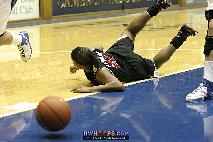 Ashleigh Newman hits the floor, but is unable to gather the loose ball