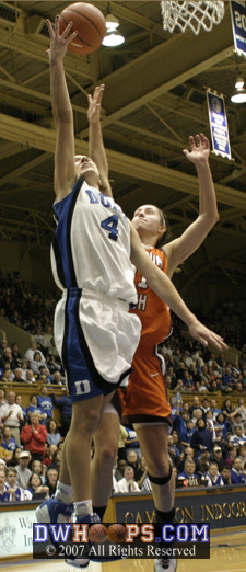 Abby Waner 
goes up for the tying layup and the foul