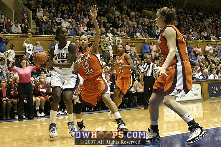 ...Bridgette drives to draw the post defender, then passes...