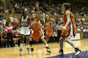...Bridgette drives to draw the post defender, then passes...