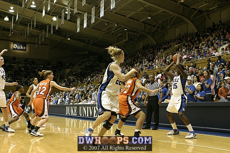 Bridgette Mitchell looks for the open player