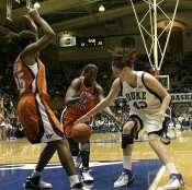 Alison Bales works to gain control of the ball...