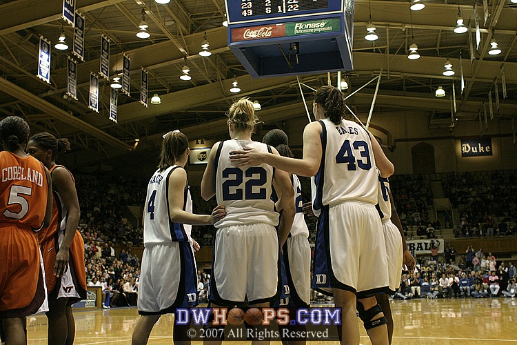 Duke huddles before Mitch attempts to convert the three-point play