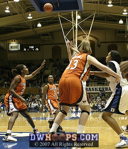 With Duke trailing by 11, Abby Waner takes and makes a long 2, as Joy Cheek battles Eleanor Brentnall for position inside