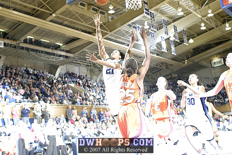 The strobe fires for Joy Cheek's perfect layup from Wanisha Smith