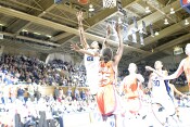 The strobe fires for Joy Cheek's perfect layup from Wanisha Smith