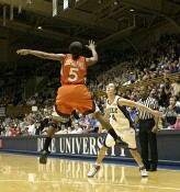 Kirby Copeland tips the ball high into the air...