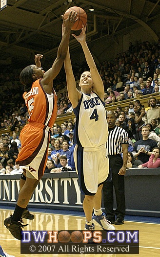 ...then gets a hand on Abby's three point miss
