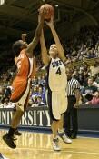...then gets a hand on Abby's three point miss