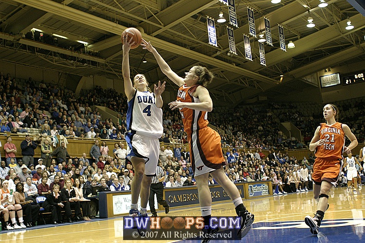 ...drawing the foul from Lindsay Biggs