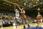 ...drawing the foul from Lindsay Biggs