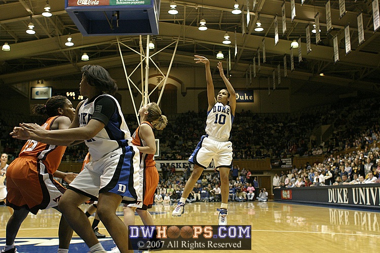 Linsdey Harding puts up an errant jumper, resulting in a titanic struggle for the rebound...