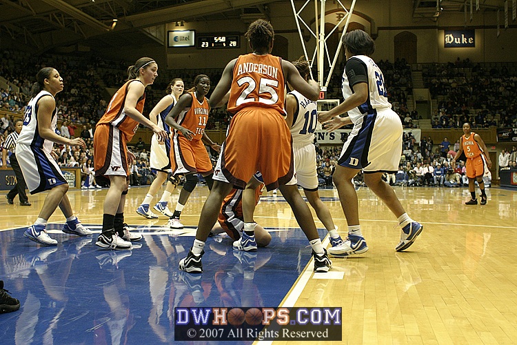 Battle for Harding Rebound [5 of 5] - Harding wrests the ball from a Hokie player...
