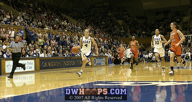 After stealing the ball, Abby Waner leads the break...
