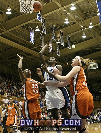 ...Bridgette Mitchell in the lane, for the layup