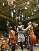 ...Bridgette Mitchell in the lane, for the layup