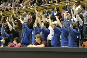 Students encourage Carrem Gay at the line