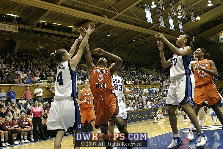 Abby Waner defends a Kirby Copeland layup attempt