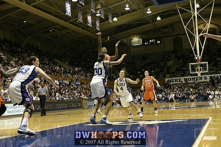 Britney Anderson takes a jumper over Carrem Gay