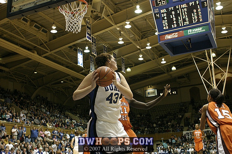 ...and Alison Bales rebounds the miss