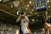 ...and Alison Bales rebounds the miss