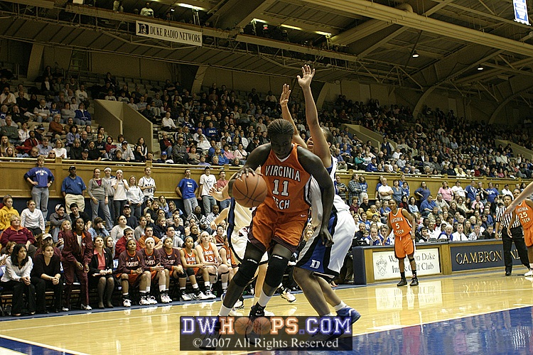Diawara drives around Wanisha Smith...