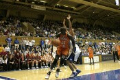 Diawara drives around Wanisha Smith...