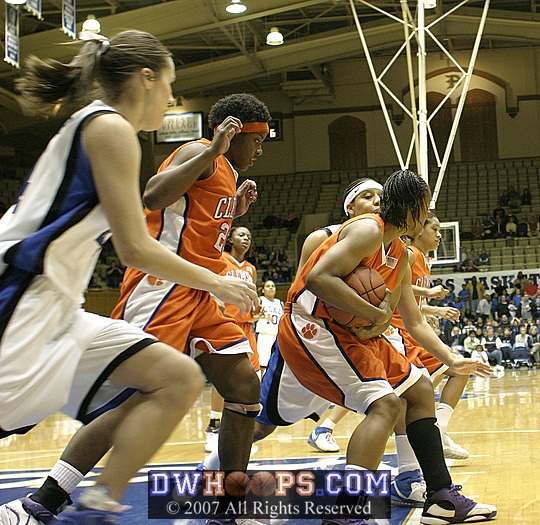 ...but it doesn't drop.  Clemson frosh Lele Hardy gets the board.