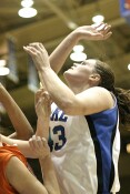 Alison Bales with the hoop, plus harm from Clemson's Susan Yenser.