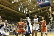 ...Bridgette Mitchell sticks back the miss.