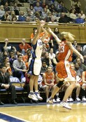 Abby launches a three from the corner...