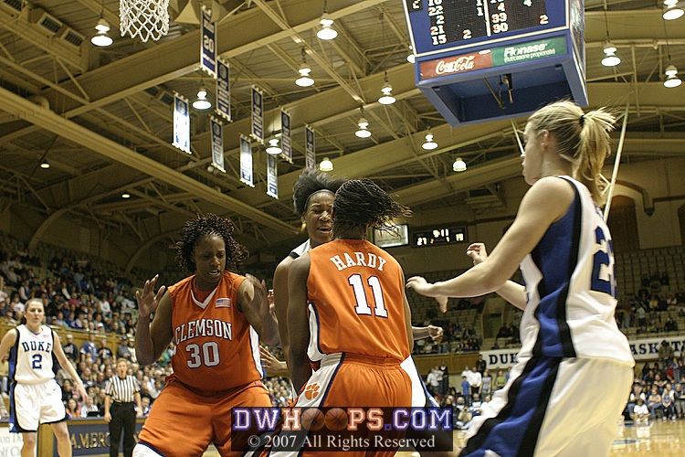 ...and Lele Hardy won't give up the rebound (1 of 4)
