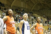 Moreemi Davis, Wanisha Smith, and Lele Hardy watch Joy Cheek's free throw drop