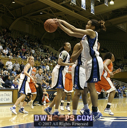 Lindsey Harding rebounds a Susan Yenser miss