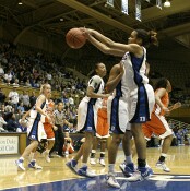 Lindsey Harding rebounds a Susan Yenser miss