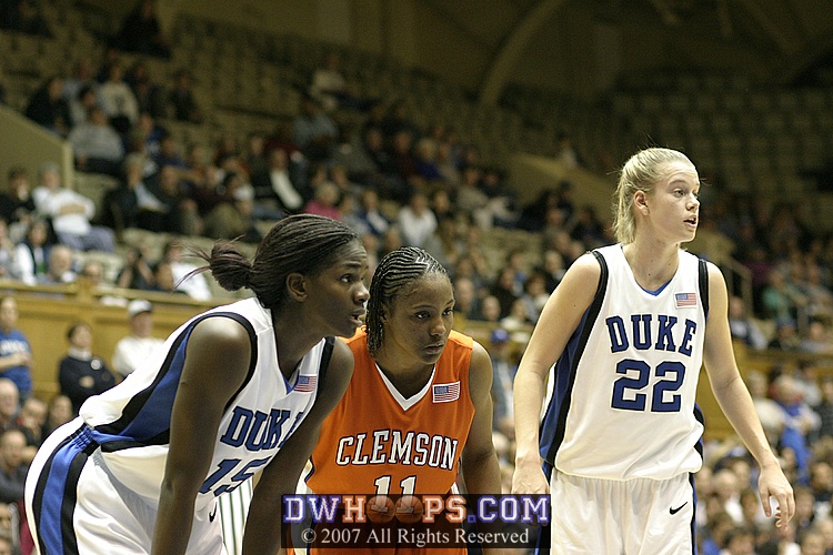Freshmen Bridgette Mitchell, Lele Hardy, and Brittany Mitch wait for the free throw