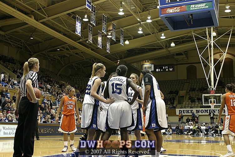 The "blue team" confers before a Clemson free throw