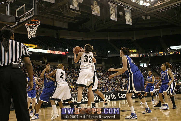 ...Corinne Groves pulls down the rebound.
