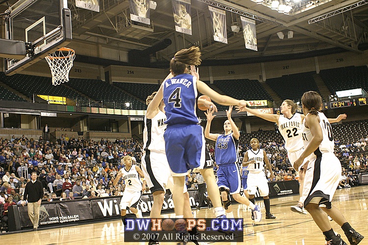...penetrates, then kicks out to Alison Bales, who drove and was fouled.