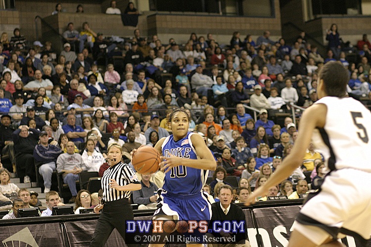 Lindsey Harding drives...