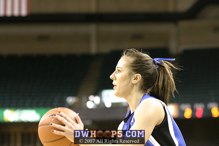 ...then dishes to Abby who extends the lead to double digits.