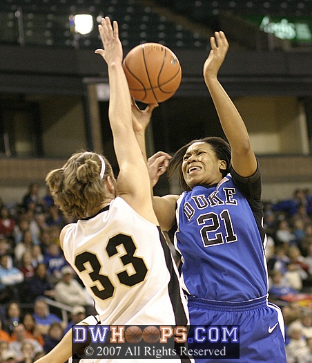 Corinne Groves and Joy Cheek battle for the ball.  Both had outstanding games - a double-double for Groves, and 13 and 6 for Cheek in just 16 minutes.