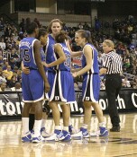 Duke huddles before two Wanisha Smith free throws.
