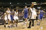 Alison Bales pulls in a long rebound...