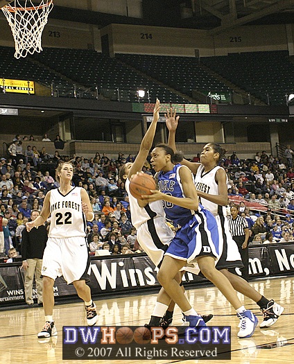 Carrem Gay goes strong to the hoop...