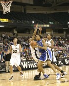 Carrem Gay goes strong to the hoop...