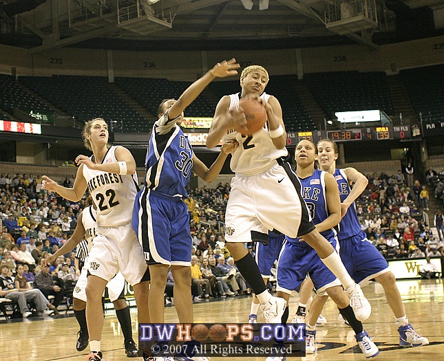 ...rebounded by Alex Tchangoue...