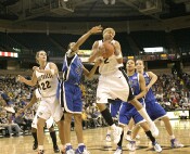 ...rebounded by Alex Tchangoue...